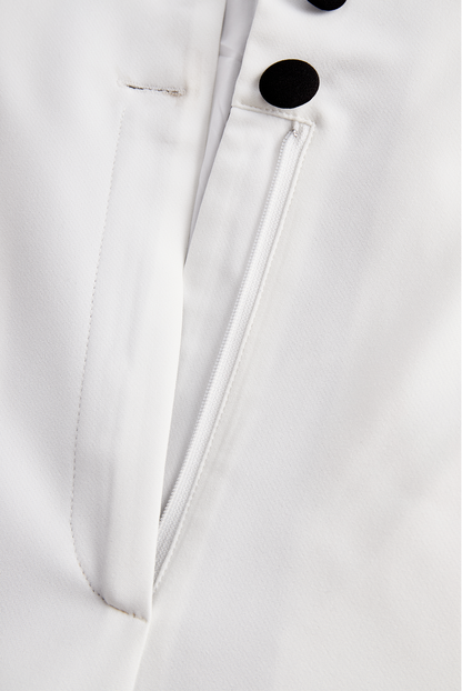 Sleek White Jumpsuit With Dual Button Detail And Black Lapel